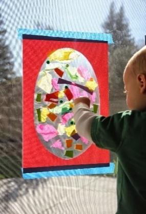 A child painting a picture

Description automatically generated with low confidence