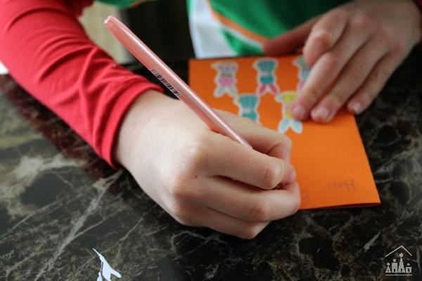 Child making an Easter card