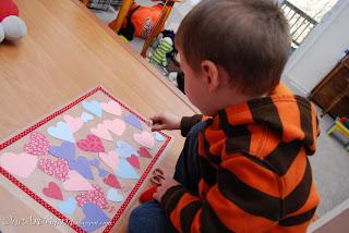 A child sitting at a table

Description automatically generated with low confidence