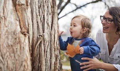 A person holding a baby

Description automatically generated with medium confidence