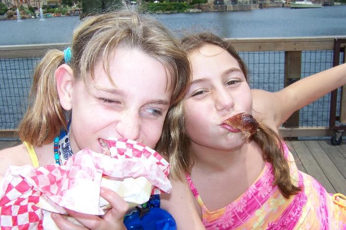 A couple girls eating ice cream

Description automatically generated with low confidence