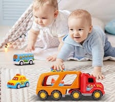 This may contain: four construction trucks made from construction paper on a table